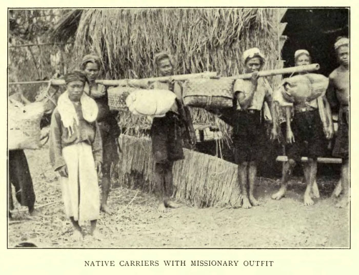 Native Carriers with Missionary Outfit